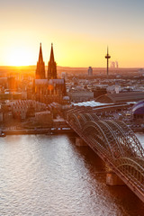 Cologne Cathedral church Germany skyline portrait format city town sunset bridge