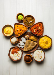 group of Indian Sweet / mithai in terracotta bowl
