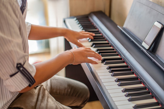 Young Asian Man Playing Classical Piano Jazz Music Concert Indoors Relax Time Antidepressant Music Therapy Concept