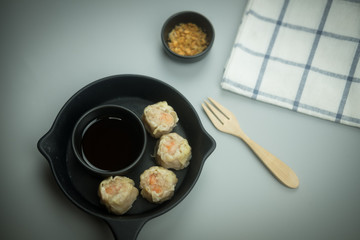 Delicious shrimp dumplings served with soy sauce