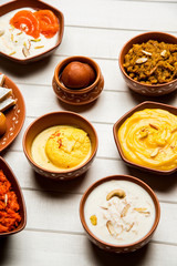 group of Indian Sweet / mithai in terracotta bowl
