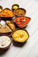 group of Indian Sweet / mithai in terracotta bowl