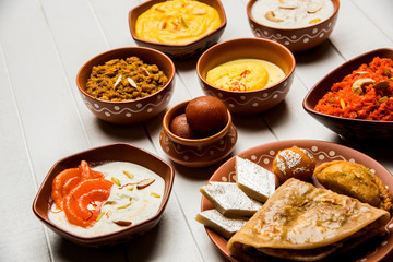 group of Indian Sweet / mithai in terracotta bowl