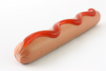 sausage with ketchup on white background