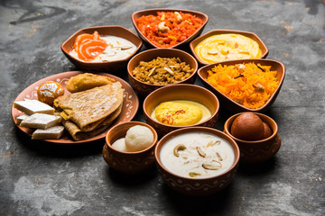 group of Indian Sweet / mithai in terracotta bowl