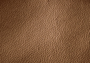  Texture of genuine leather. Brown color background.