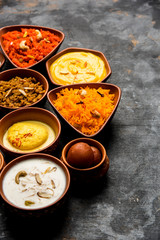 group of Indian Sweet / mithai in terracotta bowl