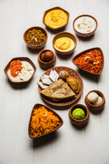group of Indian Sweet / mithai in terracotta bowl