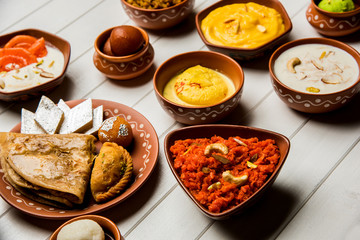 group of Indian Sweet / mithai in terracotta bowl