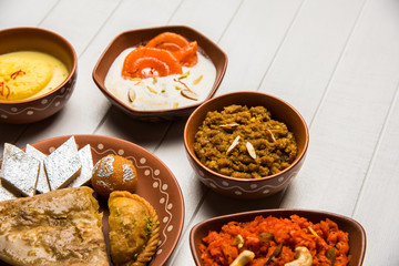 group of Indian Sweet / mithai in terracotta bowl