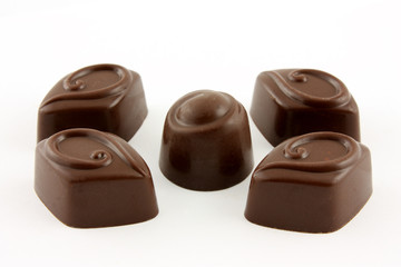 chocolate candies on white background