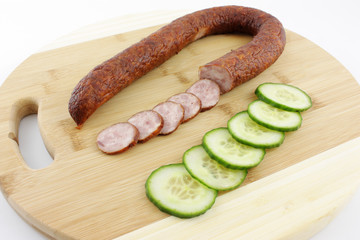 sausage and cucumber slices