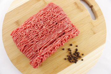 raw minced meat on a cutting board
