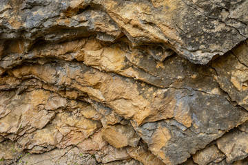 Background texture of a cracked triangle rock in a natural park congost de Mont-rebei Monrebey in Spain. 
