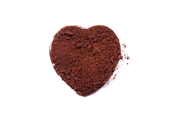 Coffee powder heart isolated on white background