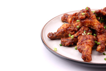 Delicious Korean fried chicken on a white background.