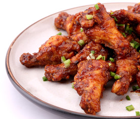 Delicious Korean fried chicken on a white background.