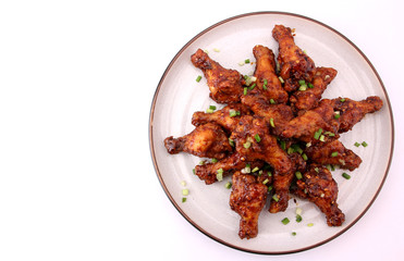 Delicious Korean fried chicken on a white background.