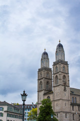 Fototapeta na wymiar Grossmunster. Romanesque Cathedral in Zurich. View of the Grossmünster. Zurich architecture.