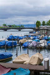 Fototapeta na wymiar Quay of Zurich. Pier in Zurich. Boats on Lake Zurich