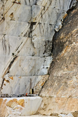 A quarry of white marble. The precious white Carrara marble has been extracted from the Alpi Apuane quarries since Roman times.