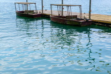 Fototapeta na wymiar Boats on water at famous attraction lake inTaiwan.