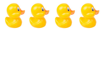 Plastic yellow duck toy isolated on white background