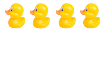 Plastic yellow duck toy isolated on white background