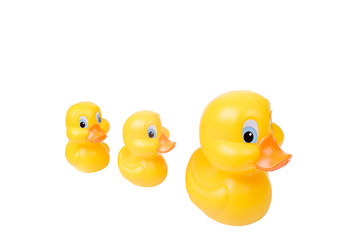 Plastic yellow duck toy isolated on white background