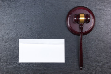 Law concept. Business card. Corporate stationery set mockup. Blank textured brand ID elements on wooden table, gavel. Office desk tabl. Top view. blackboard