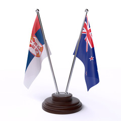 Serbia and New Zealand, two table flags isolated on white background. 3d image