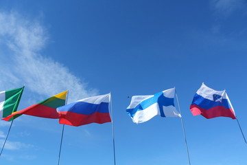 Flags of nations on a pole