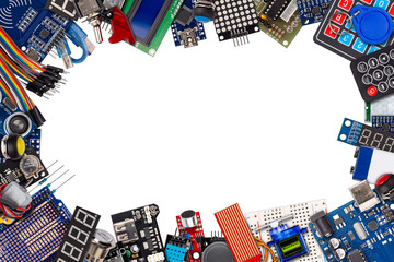 frame collage with copy space of microcontroller board display sensor button switches cable wire accessories and equipment isolated white electronics concept background