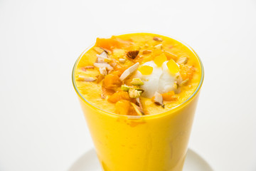 Falooda / Faluda is a popular Indian dessert - Strawberry and Mango flavoured which has Ice cream, noodles, sweet basil seeds and nuts, selective focus