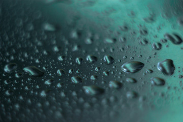 water drops on blue surface