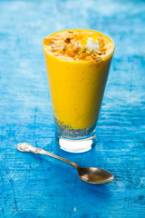 Falooda / Faluda is a popular Indian dessert - Strawberry and Mango flavoured which has Ice cream, noodles, sweet basil seeds and nuts, selective focus