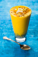Falooda / Faluda is a popular Indian dessert - Strawberry and Mango flavoured which has Ice cream, noodles, sweet basil seeds and nuts, selective focus