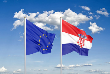 European Union vs Croatia. Thick colored silky flags of European Union and Croatia. 3D illustration on sky background. - Illustration