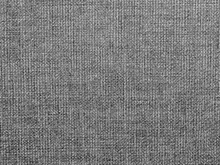 Naklejka na ściany i meble Textured background of gray natural fabric 