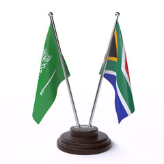 Saudi Arabia and South Africa, two table flags isolated on white background. 3d image