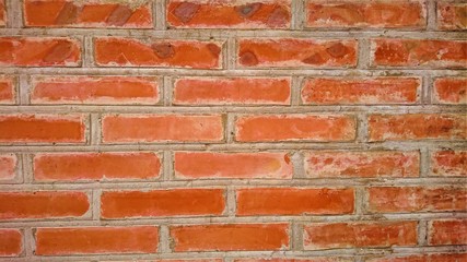 brick red stone blocks closeup. Wall texture