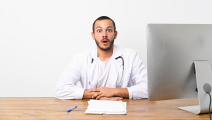 Doctor Colombian man with surprise facial expression