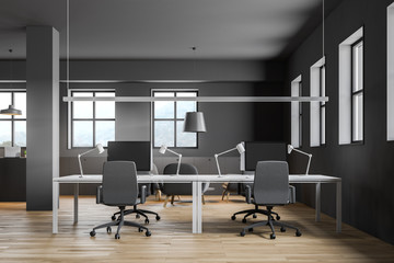 Gray open space office with lounge area