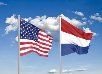 Obraz premium United States of America vs Netherlands. Thick colored silky flags of America and Netherlands. 3D illustration on sky background. - Illustration