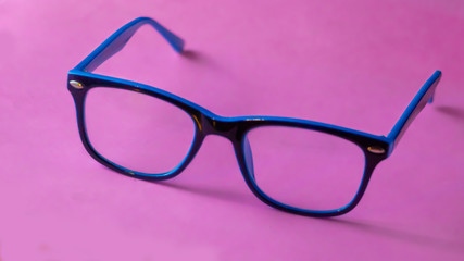 glasses isolated on pink background