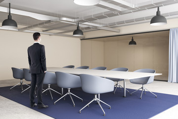 Businessman in modern conference room