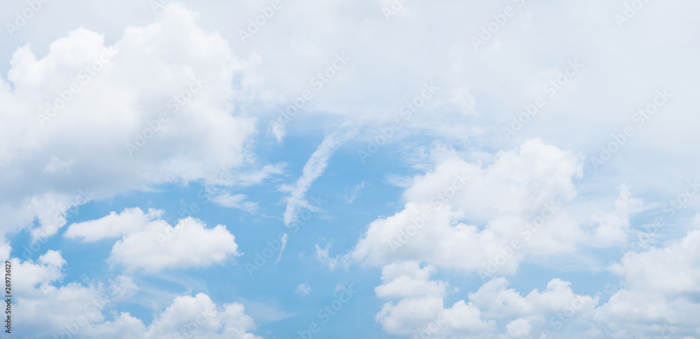 Wall mural blue sky background with white clouds during day . panorama .