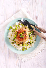 Chicken and peas stew with rice