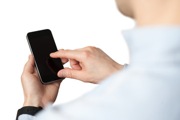 Hand holding and Touch on Black Smartphone with blank screen on white background
