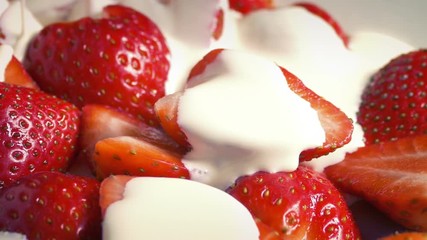 Cream Pours On Strawberries